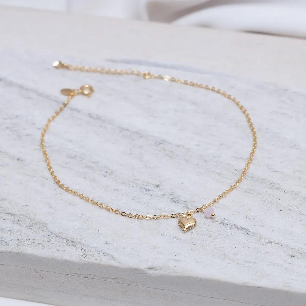 TORNOZELEIRA CORAÇÃO COM CRISTAL ROSA BANHO OURO 18K