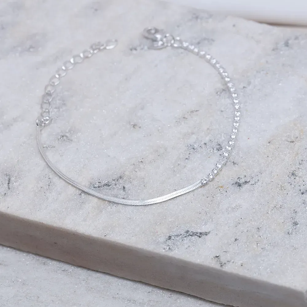 PULSEIRA FITA ESPELHADA E COM ZIRCÔNIAS BANHO PRATA