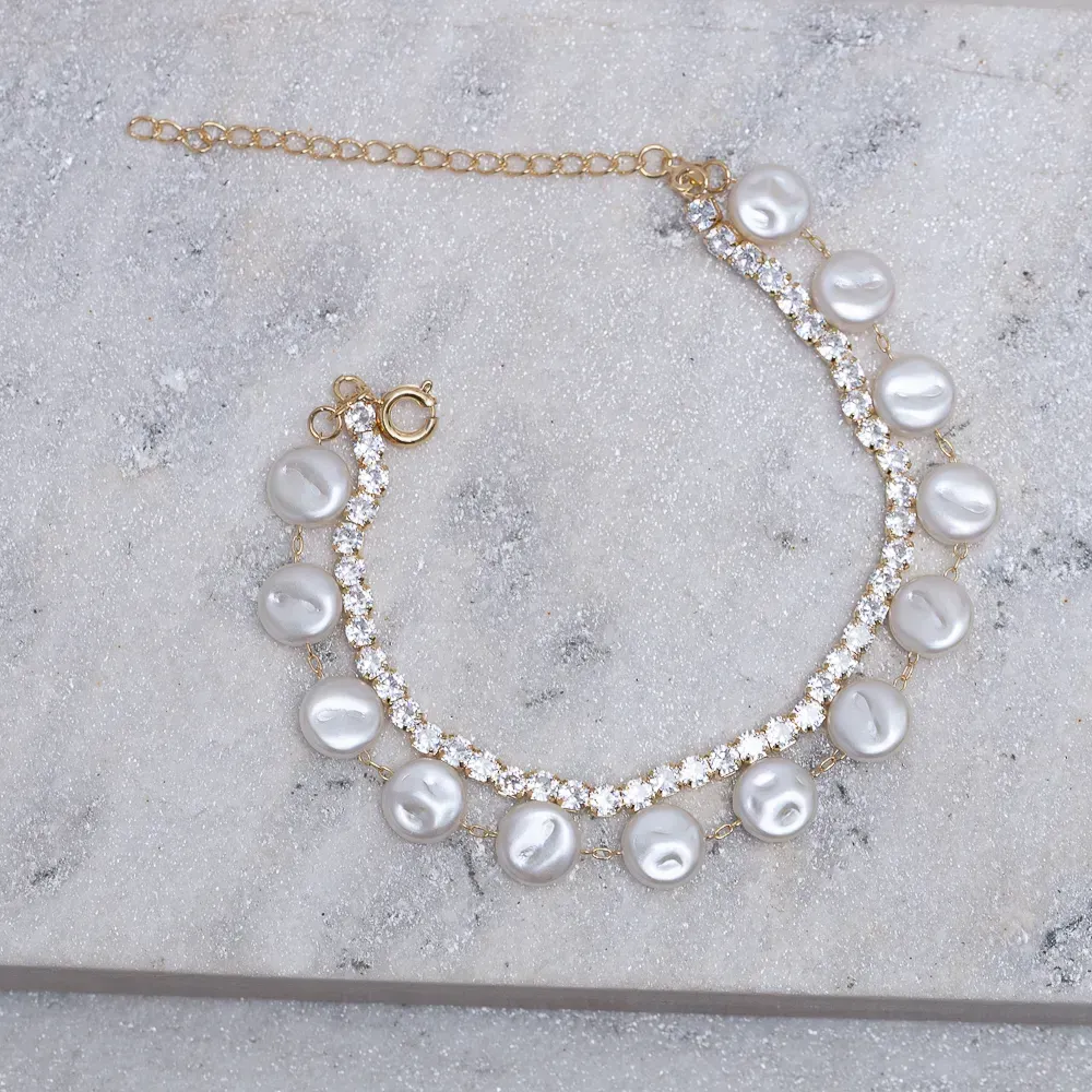 PULSEIRA PÉROLAS COM FIO RIVIERA BANHO OURO 18K