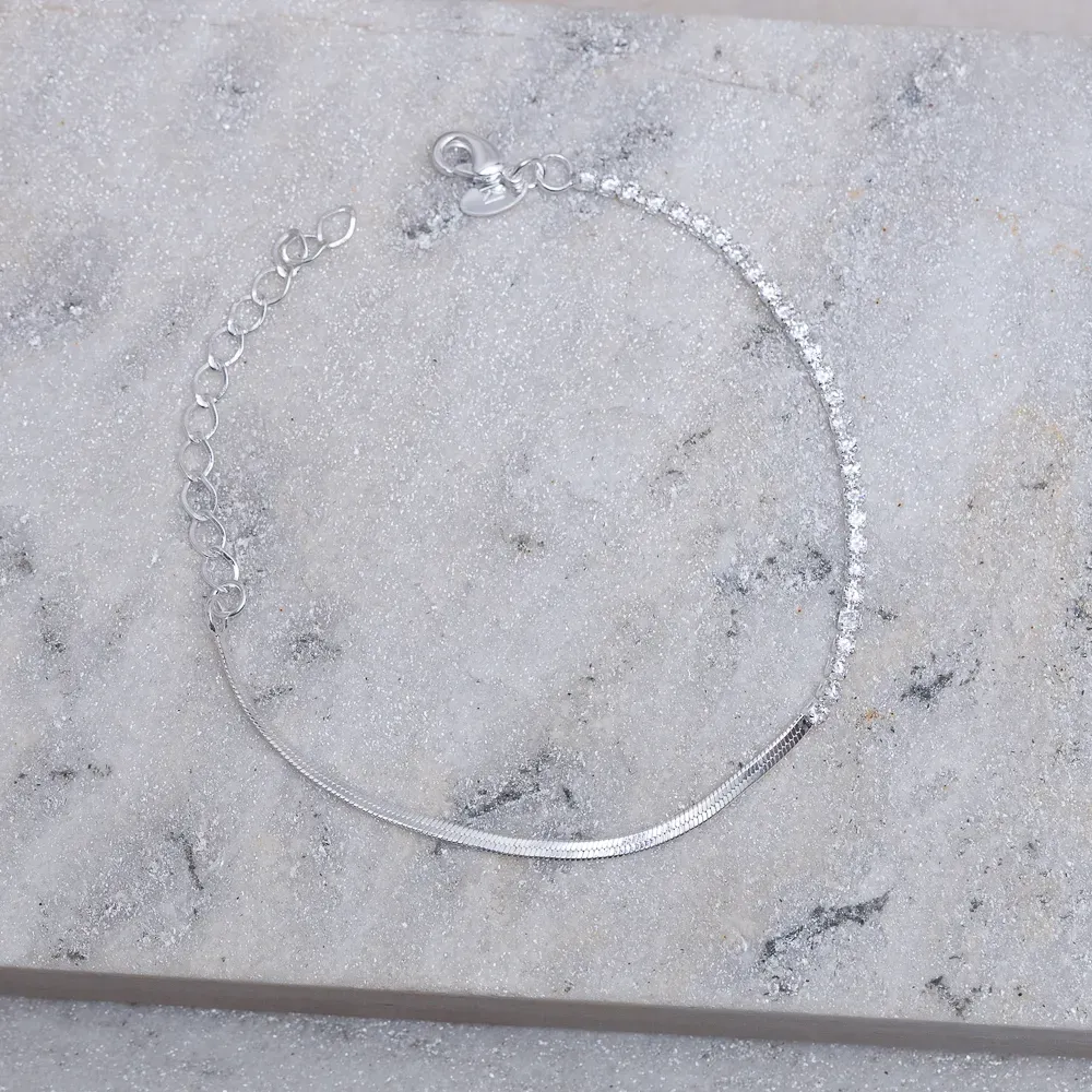 PULSEIRA FITA ESPELHADA E COM ZIRCÔNIAS BANHO PRATA