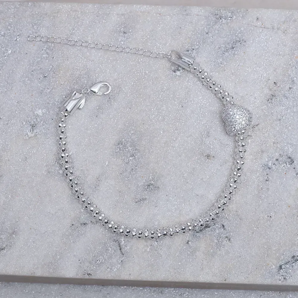 PULSEIRA OCA COM BERLOQUE CORAÇÃO CRAVEJADO BANHO PRATA