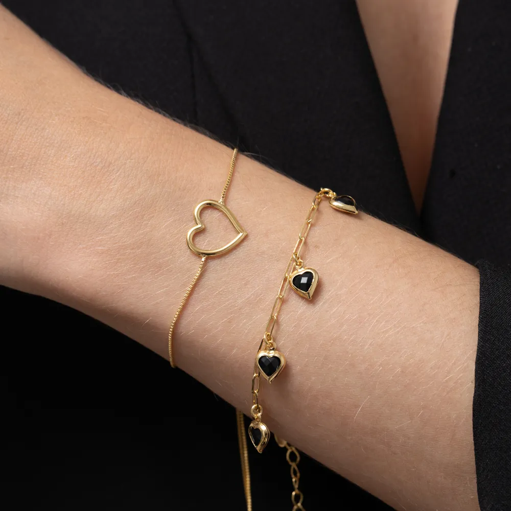 PULSEIRA ELOS CARTIER COM CORAÇÕES NEGROS BANHO OURO 18K