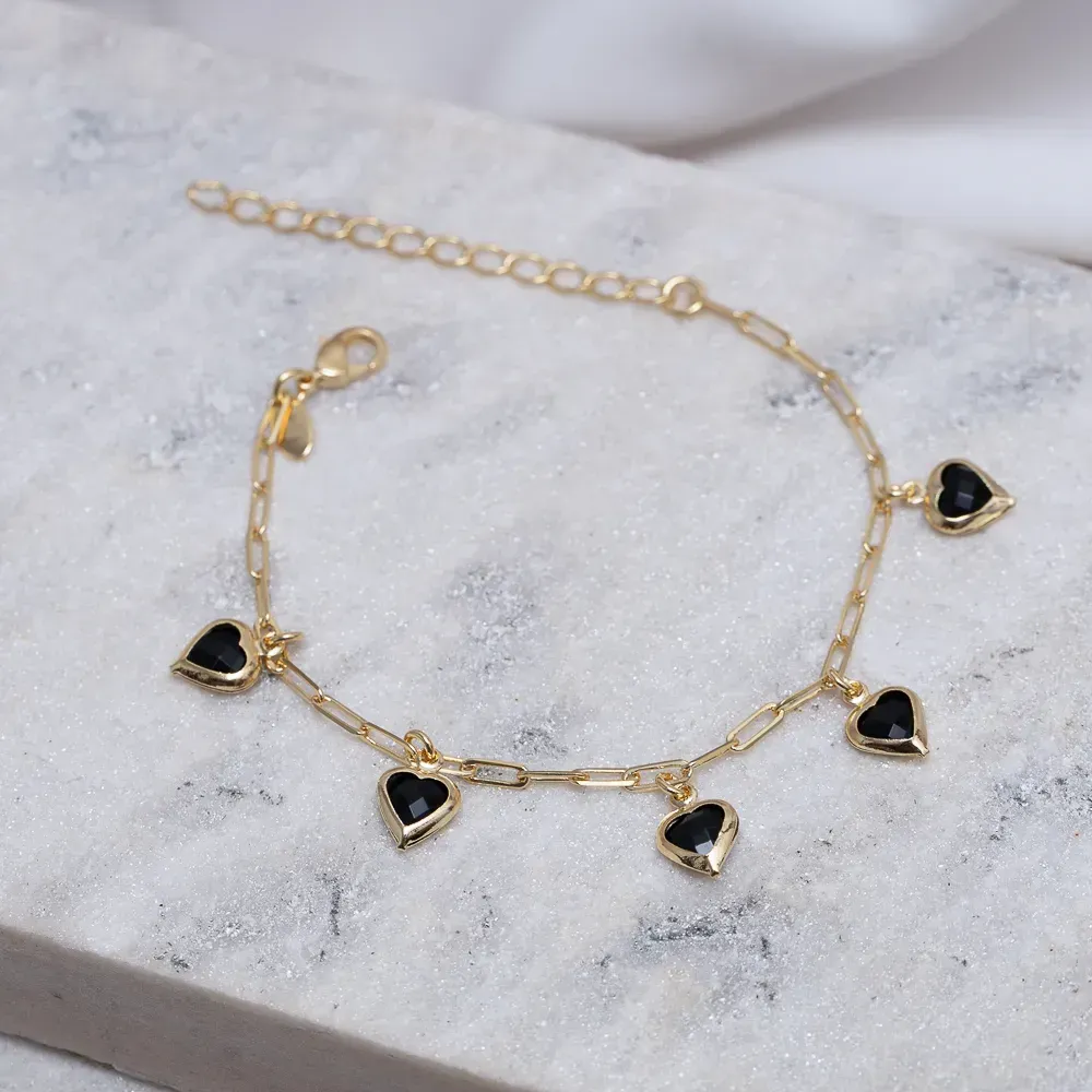 PULSEIRA ELOS CARTIER COM CORAÇÕES NEGROS BANHO OURO 18K