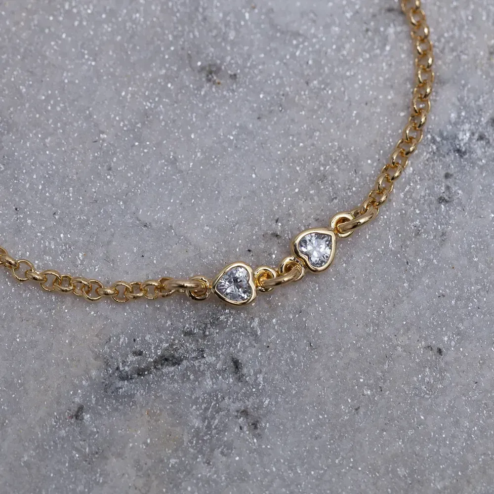 PULSEIRA INFANTIL CORAÇÕES CRISTAIS BANHO OURO 18K