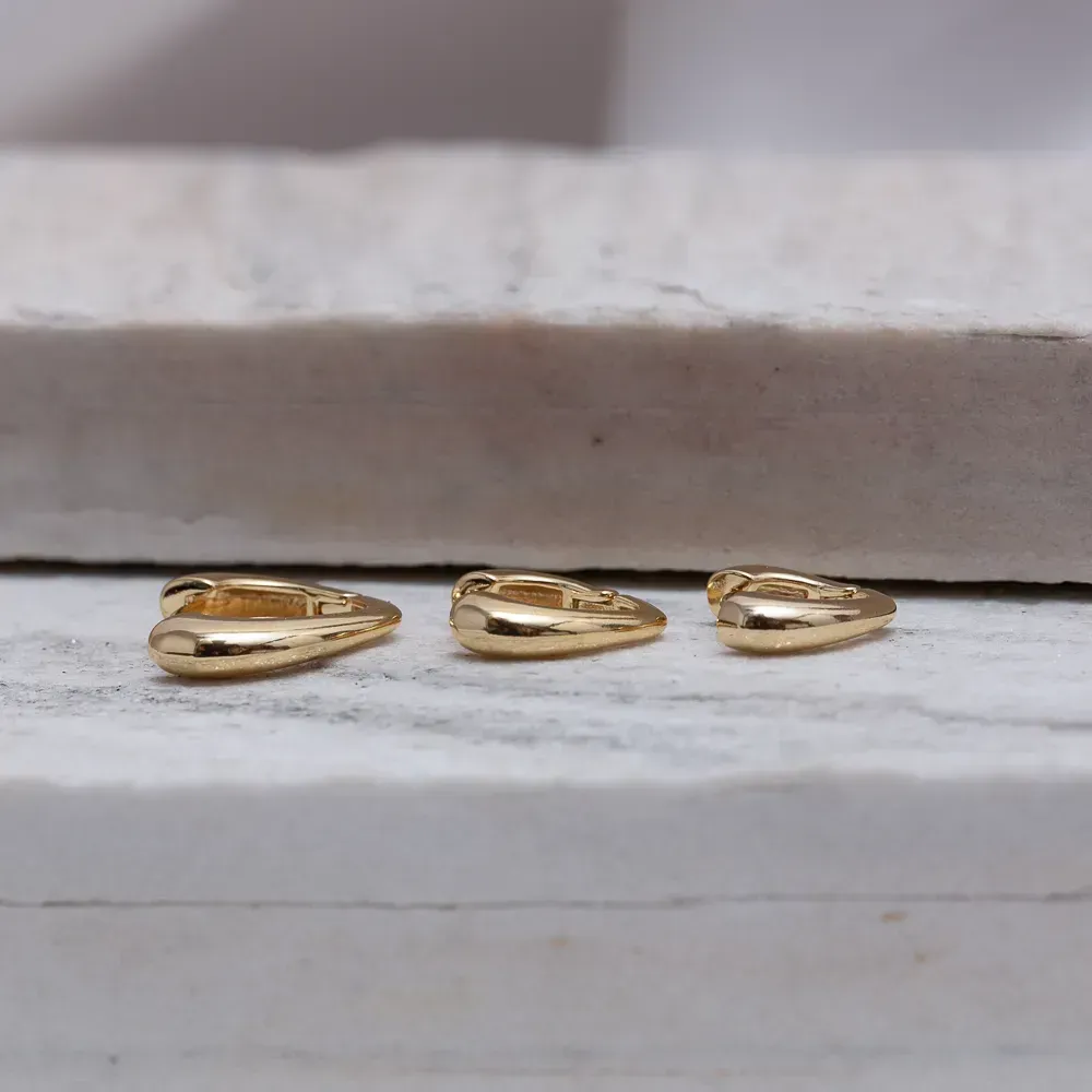BRINCO ARGOLA M ABAULADA LISA BANHO OURO 18K