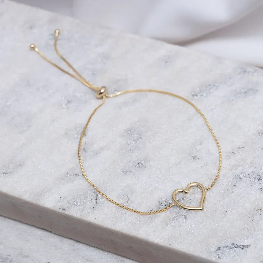 PULSEIRA REGULAGEM CORAÇÃO VAZADO BANHO OURO 18K