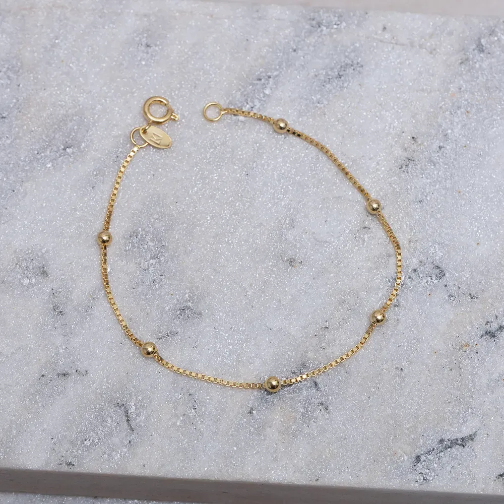 PULSEIRA VENEZIANA COM BOLINHAS LISAS BANHO OURO 18K