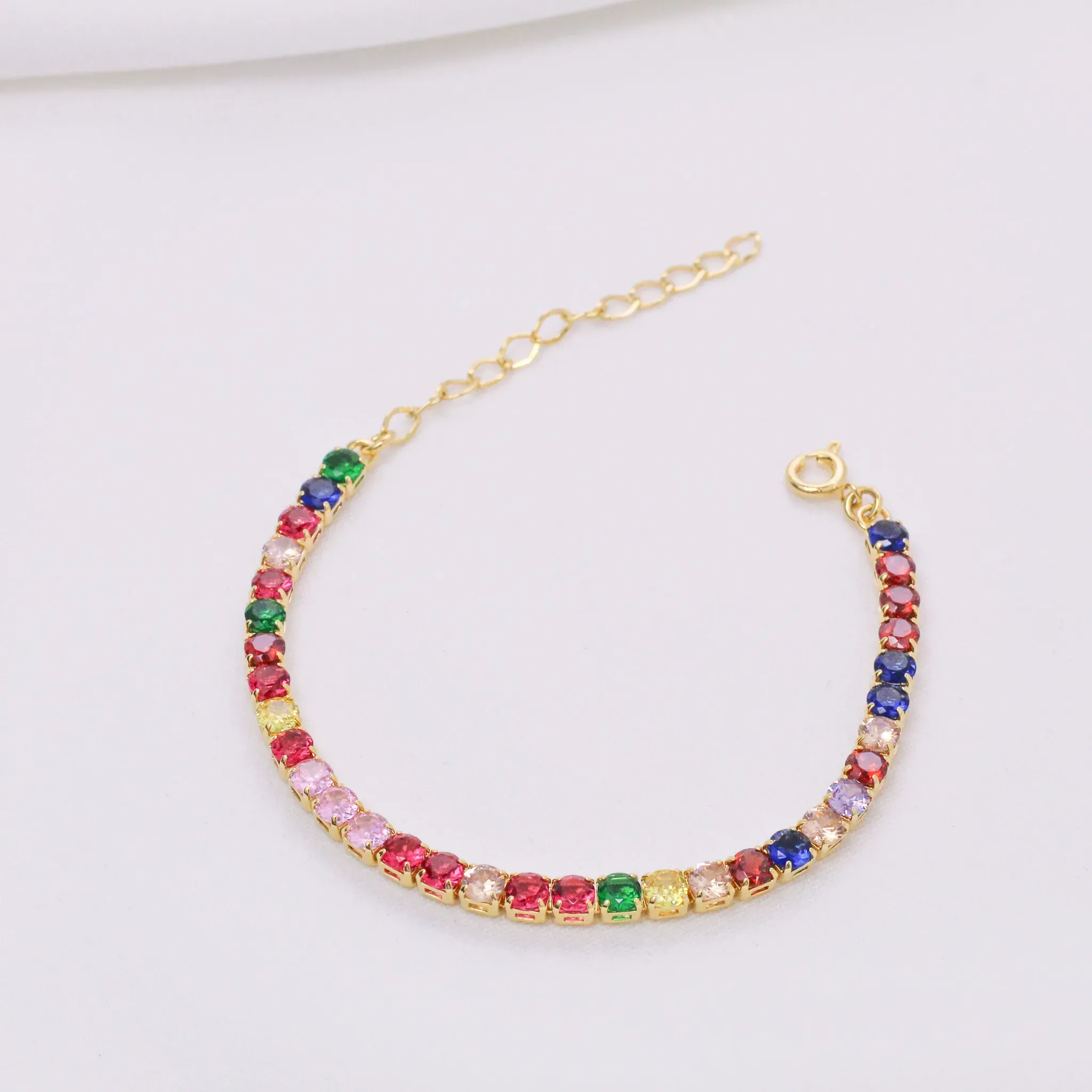 PULSEIRA RIVIERA COM ZIRCÔNIAS COLORIDAS M BANHO OURO 18K