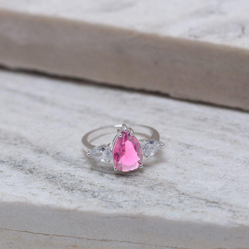 ANEL FORMATURA GOTA COM PEDRA ROSA IOGURTE BANHO PRATA