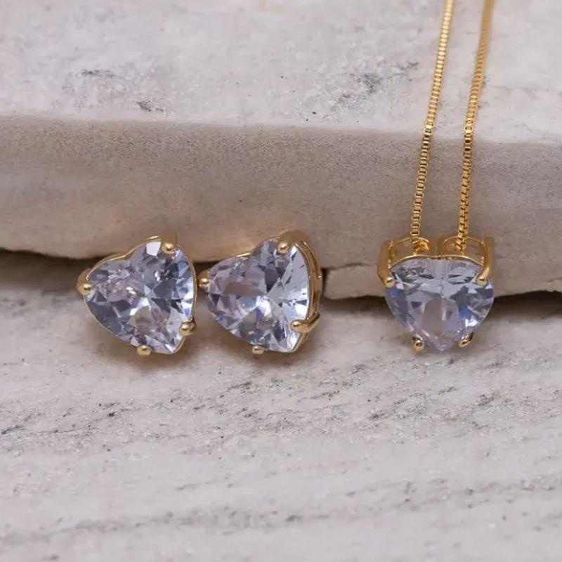 CONJUNTO CORAÇÃO PONTO DE LUZ CRISTAL BANHO OURO 18K CONJUNTO CORAÇÃO PONTO DE LUZ CRISTAL BANHO OURO 18K