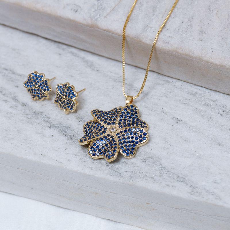 CONJUNTO FLOR ZIRCÔNIA AZUL ROYAL BANHO OURO 18K
