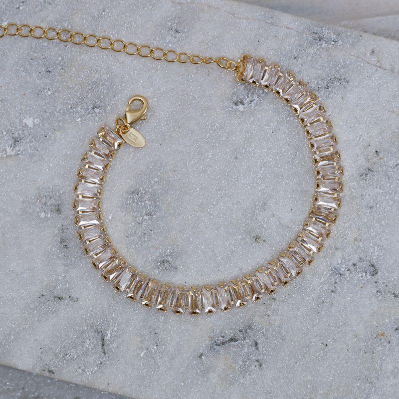 PULSEIRA RIVIERA COM ZIRCÔNIAS NAVETE CRISTAL BANHO OURO 18K