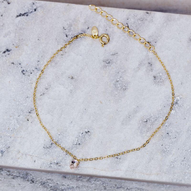 TORNOZELEIRA PONTO DE LUZ COM PEDRA ROSA CLARO BANHO 18K