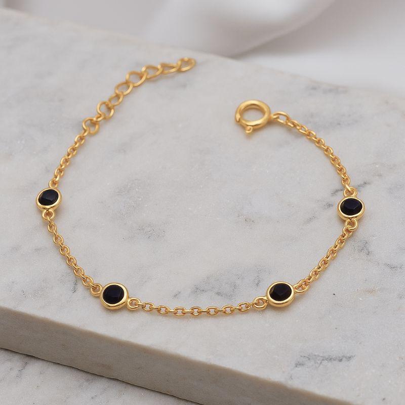 PULSEIRA INFANTIL COM PEDRA PRETA BANHO OURO 18K PULSEIRA INFANTIL COM PEDRA PRETA BANHO OURO 18K