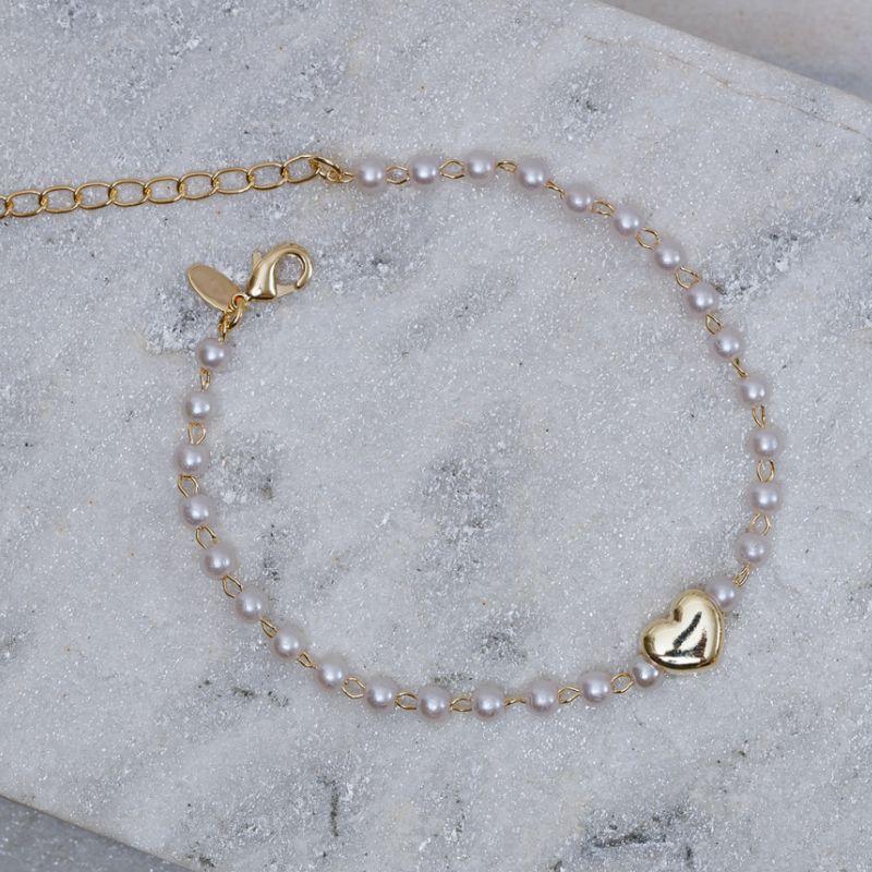 PULSEIRA PÉROLA COM CORAÇÃO LISO BANHO OURO 18K