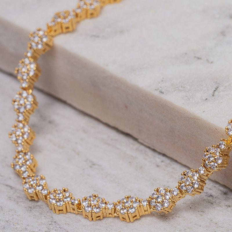 COLAR RIVIERA FLOR CRAVEJADO COM ZIRCÔNIAS CRISTAIS BANHO OURO 18K