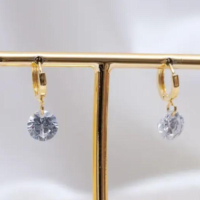 BRINCO ARGOLINHA PONTO DE LUZ BANHO OURO 18K