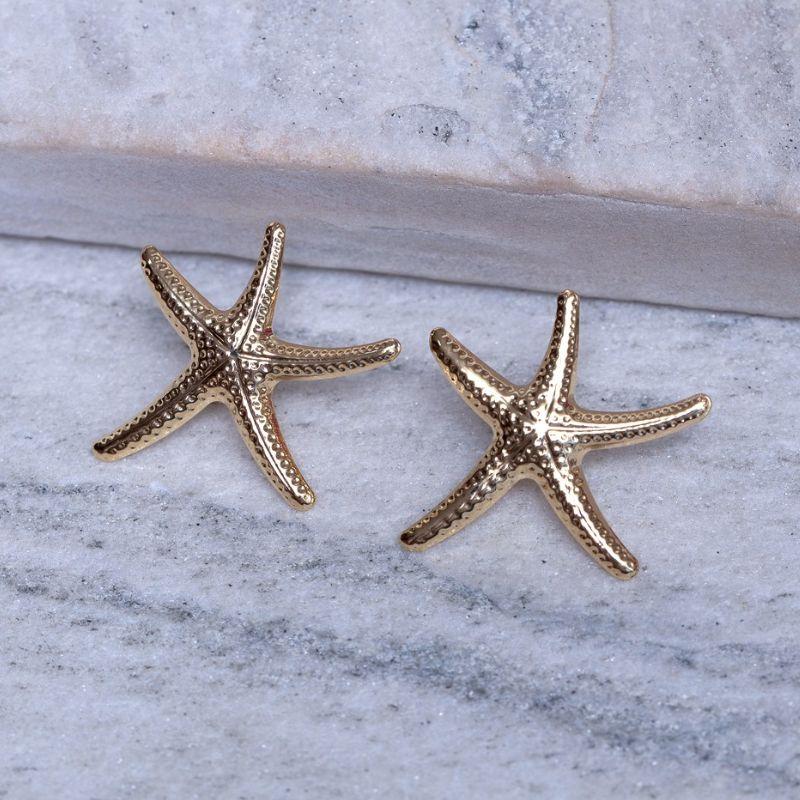 BRINCO ESTRELA DO MAR TRABALHADA BANHO OURO 18K