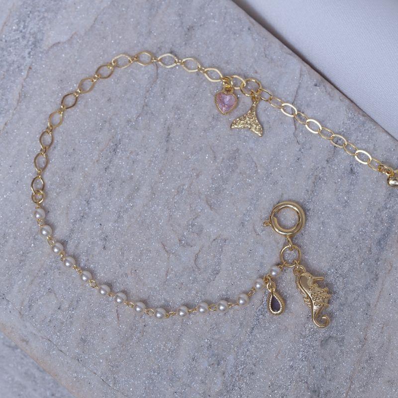 PULSEIRA PÉROLA COM PINGENTES DO MAR BANHO OURO 18K