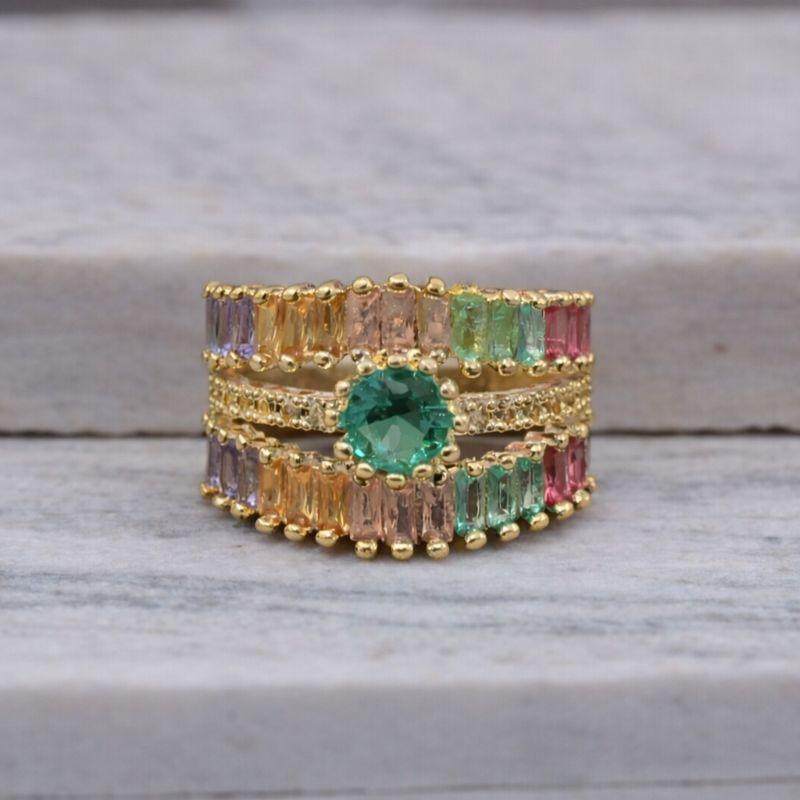 ANEL TRIPLO CRAVEJADO COM ZIRCÔNIAS COLORIDAS BANHO OURO 18K