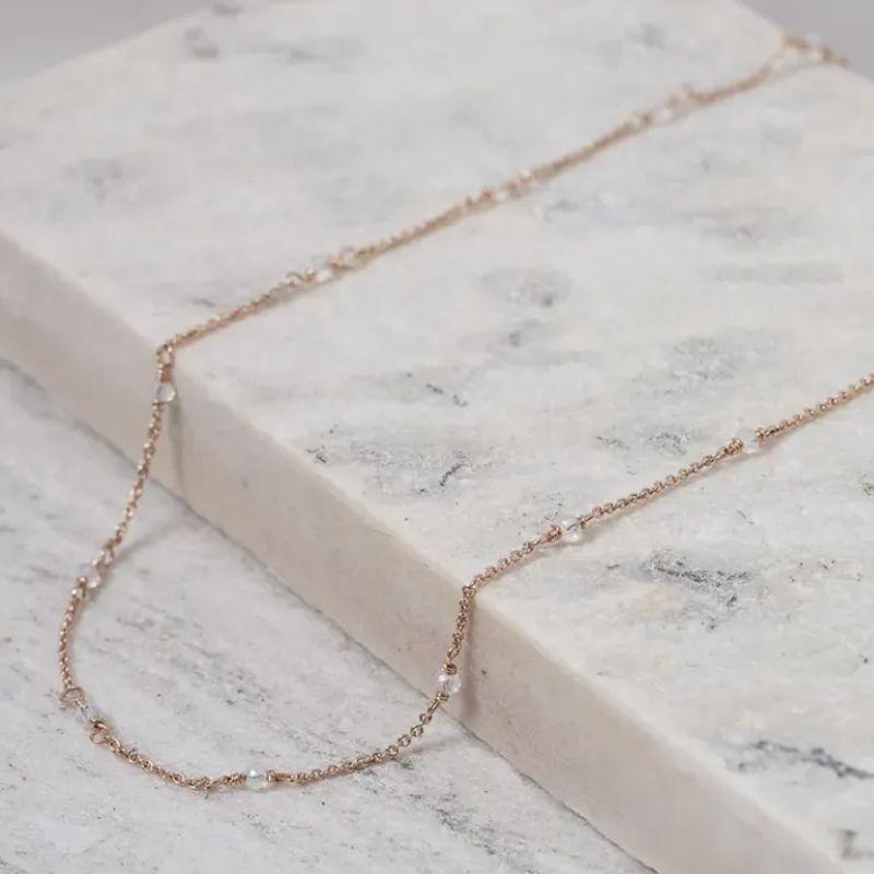 COLAR LONGO COM ZIRCÔNIAS CRISTAIS BANHO ROSÉ