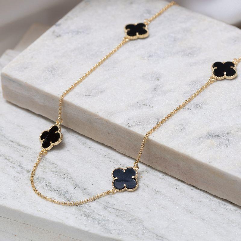 COLAR LONGO TREVO PRETO BANHO OURO 18K