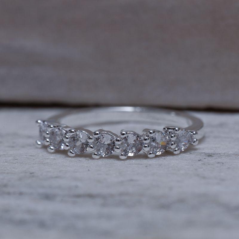 ANEL CORAÇÕES CRISTAIS 3 GARRAS BANHO PRATA