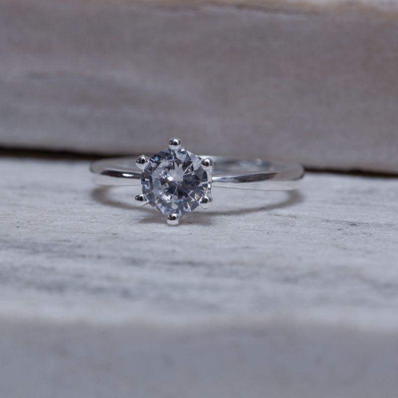 ANEL SOLITÁRIO 6 GARRAS BANHO PRATA