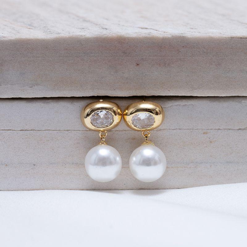 BRINCO PÉROLA COM BASE CRISTAL BANHO OURO 18K