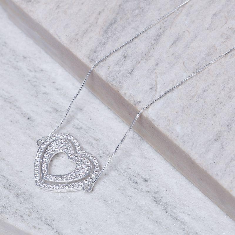 COLAR CORAÇÃO DUPLO COM ZIRCÔNIAS CRISTAIS BANHO PRATA