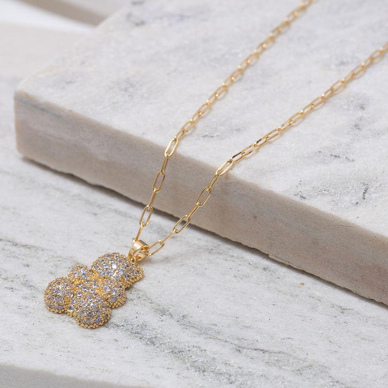 COLAR ELOS CARTIER URSO CRAVEJADO COM ZIRCÔNIAS BANHO OURO 18K