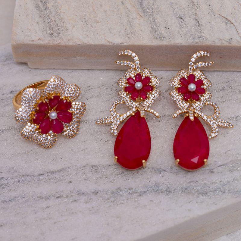 CONJUNTO FLOR COM ZIRCÔNIAS E PEDRA MARSALA BANHO OURO 18K
