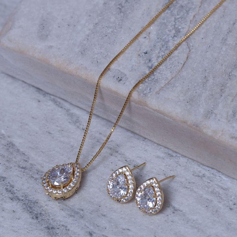 CONJUNTO GOTA CRISTAL E CRAVEJADA BANHO OURO 18K