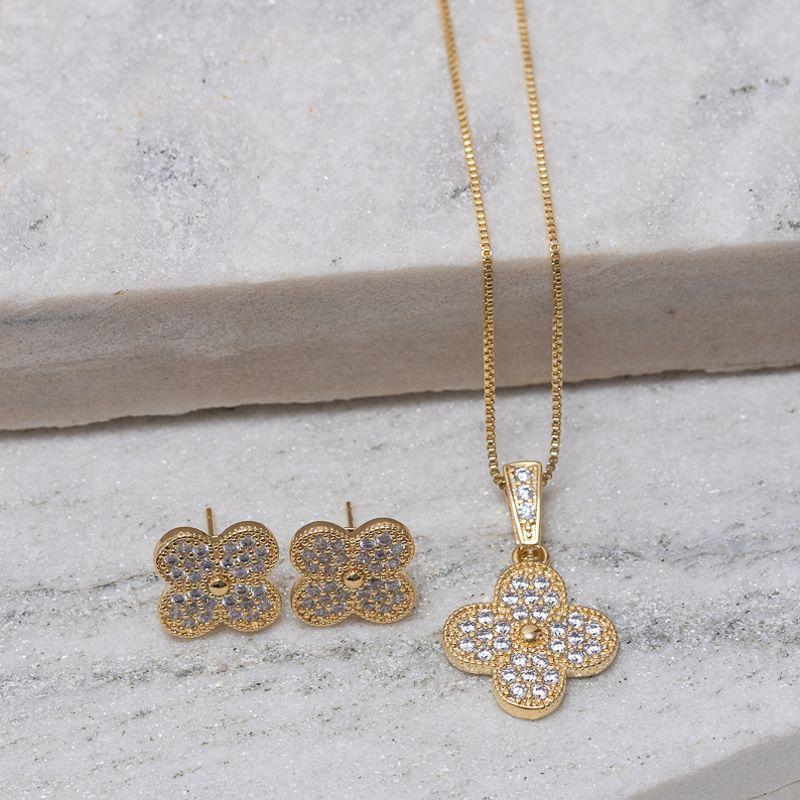CONJUNTO VIRGÍNIA CRAVEJADO COM ZIRCÔNIAS CRISTAIS BANHO OURO 18K