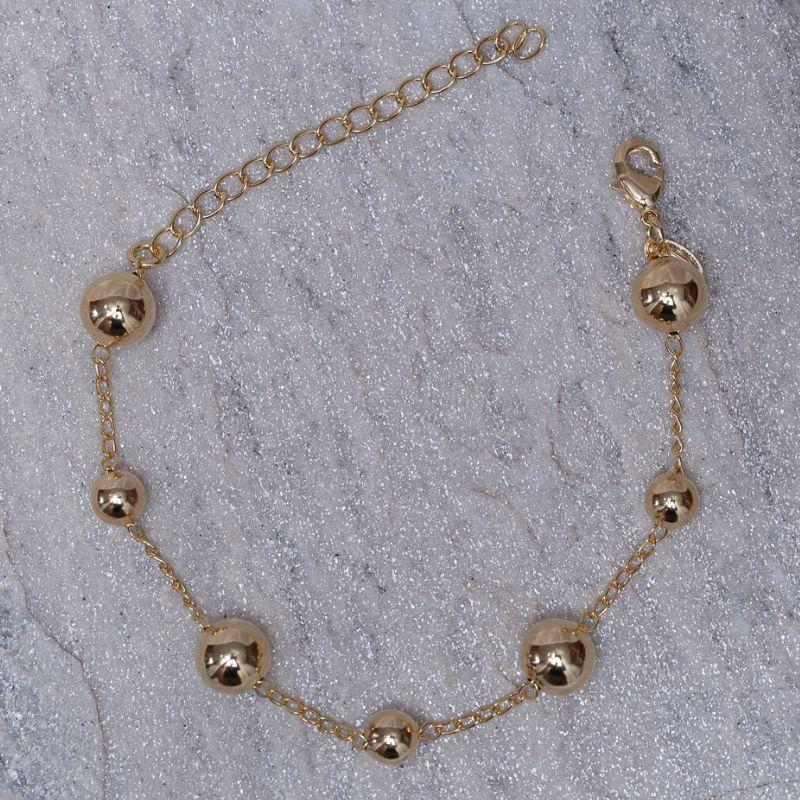 PULSEIRA BOLINHAS G LISAS BANHO OURO 18K