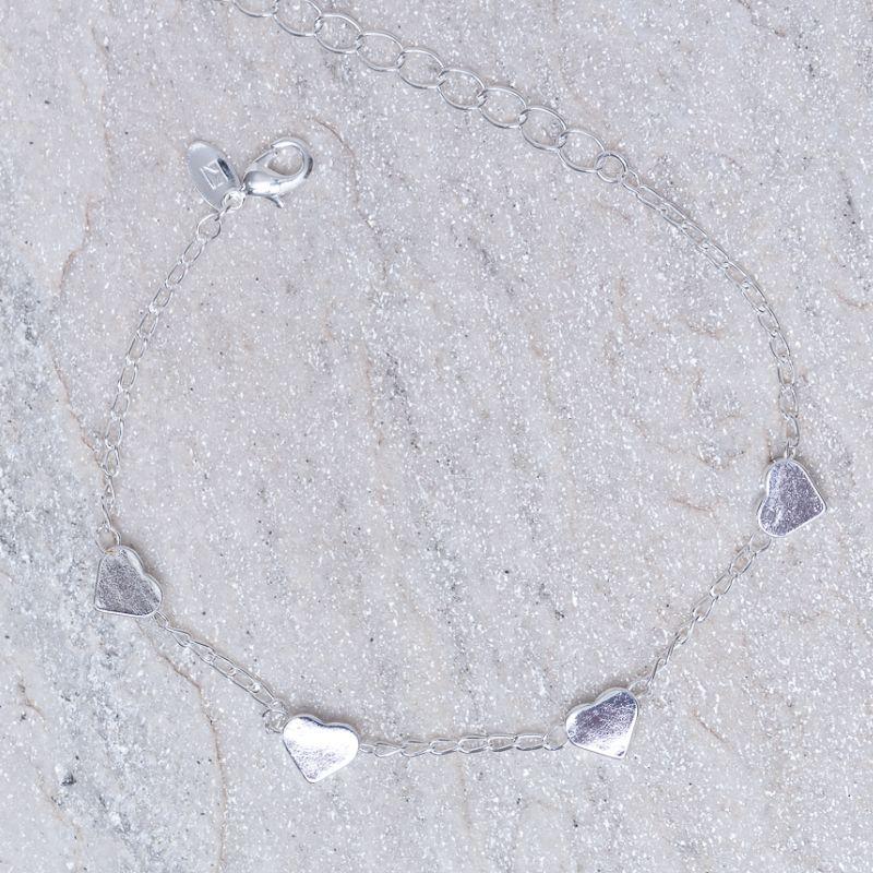 PULSEIRA CORAÇÕES LISOS BANHO PRATA