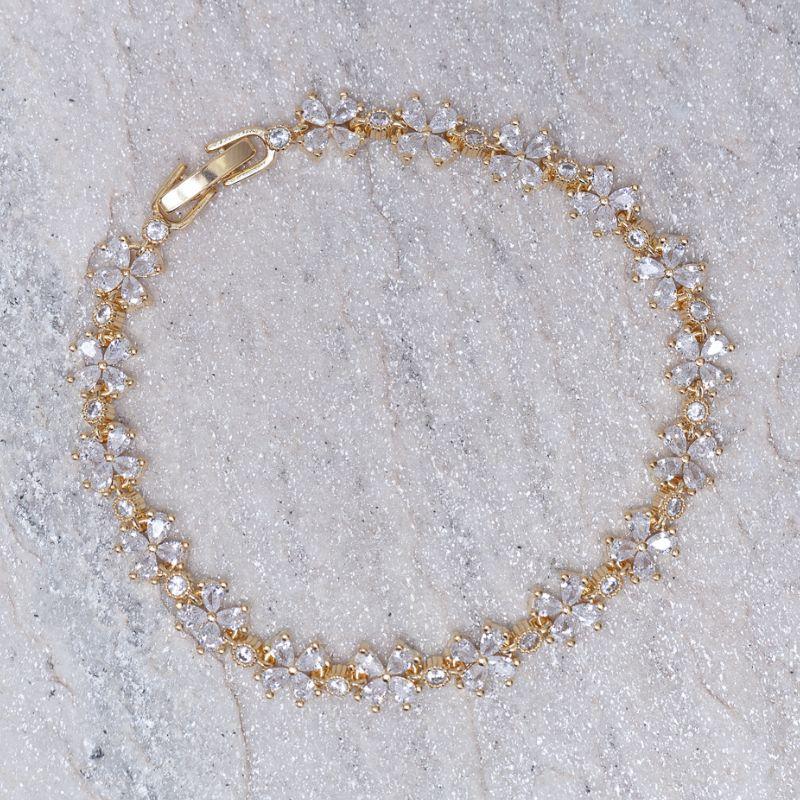 PULSEIRA FLORZINHA RIVIERA CRISTAL BANHO OURO 18K