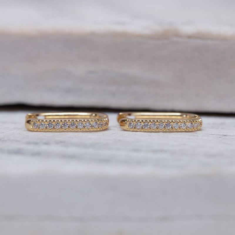 BRINCO ARGOLA OVAL CRAVEJADA M BANHO OURO 18K