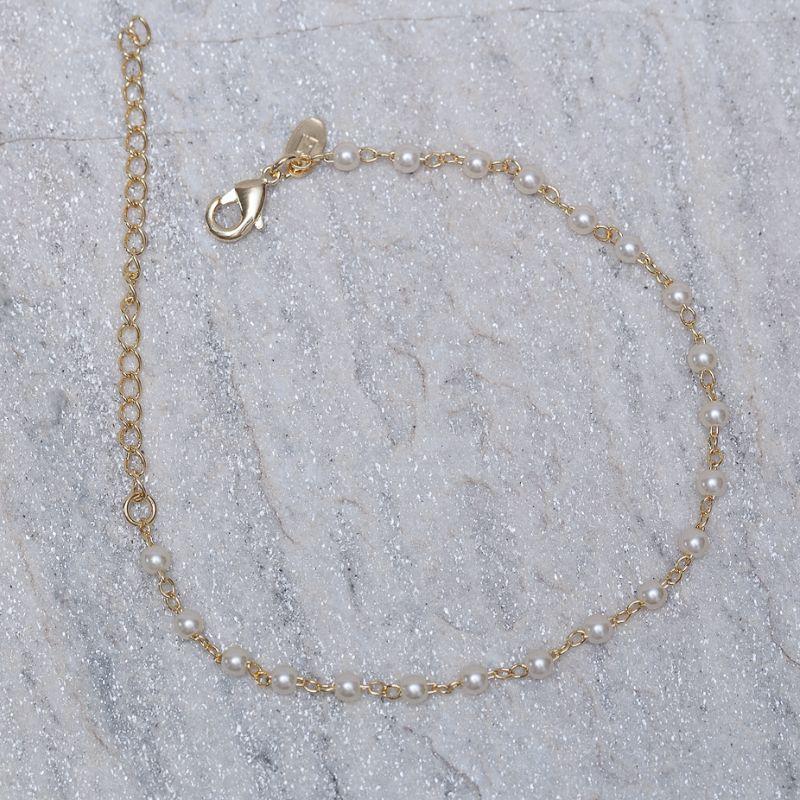 PULSEIRA PÉROLAS PP BANHO OURO 18K