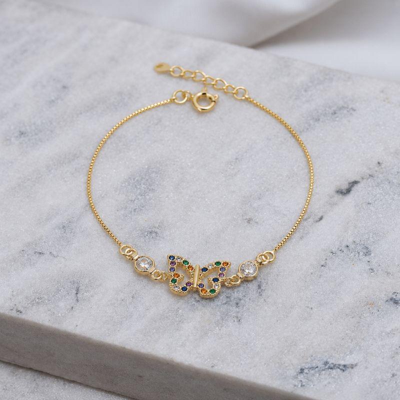 PULSEIRA BORBOLETA COM ZIRCÔNIAS COLORIDAS BANHO OURO 18K