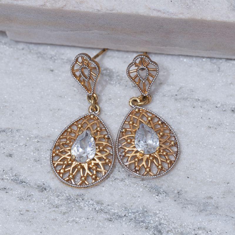 BRINCO GOTA INDIANA COM PEDRA CRISTAL BANHO OURO 18K