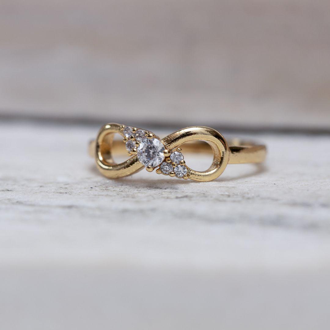 ANEL LAÇO COM ZIRCÔNIAS CT BANHO OURO 18K