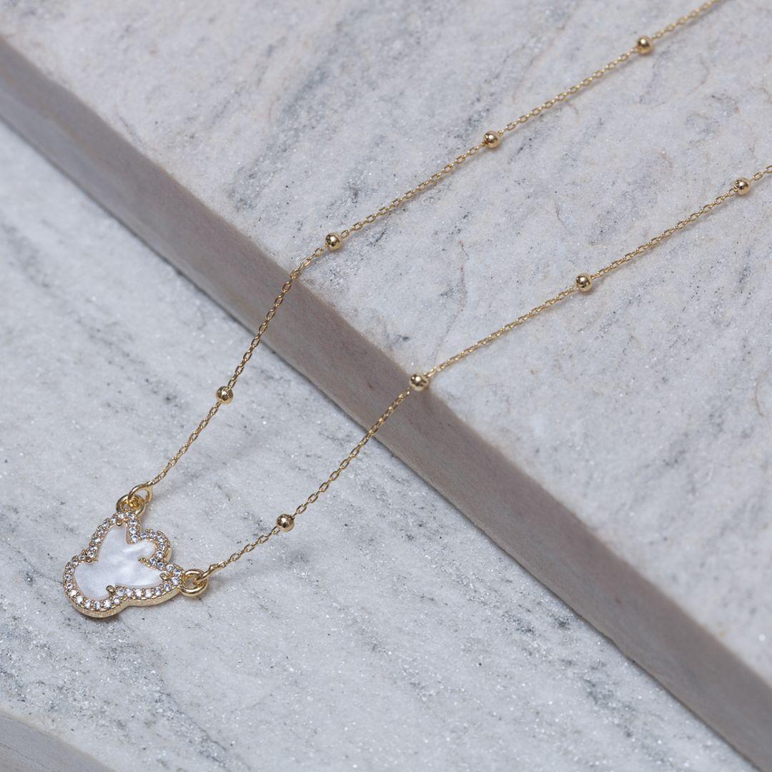COLAR ESPÍRIO SANTO MADRE PÉROLA BANHO OURO 18K