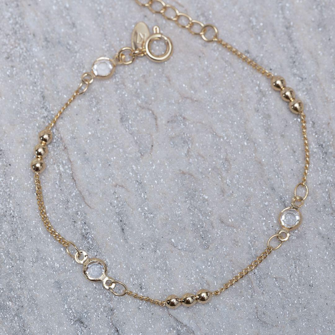 PULSEIRA BOLINHAS E CRISTAIS BANHO OURO 18K