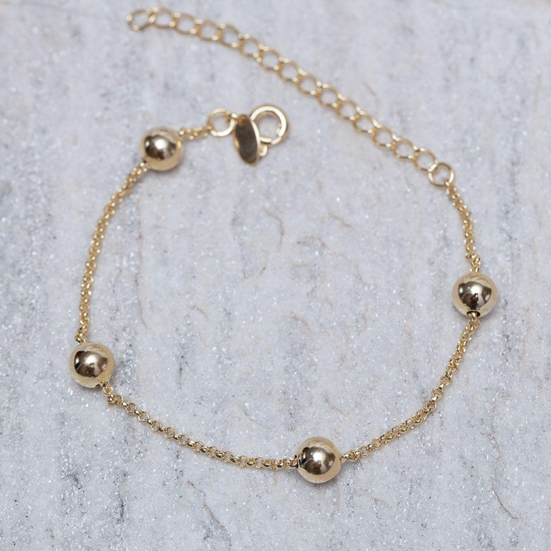 PULSEIRA BOLINHAS M BANHO OURO 18K