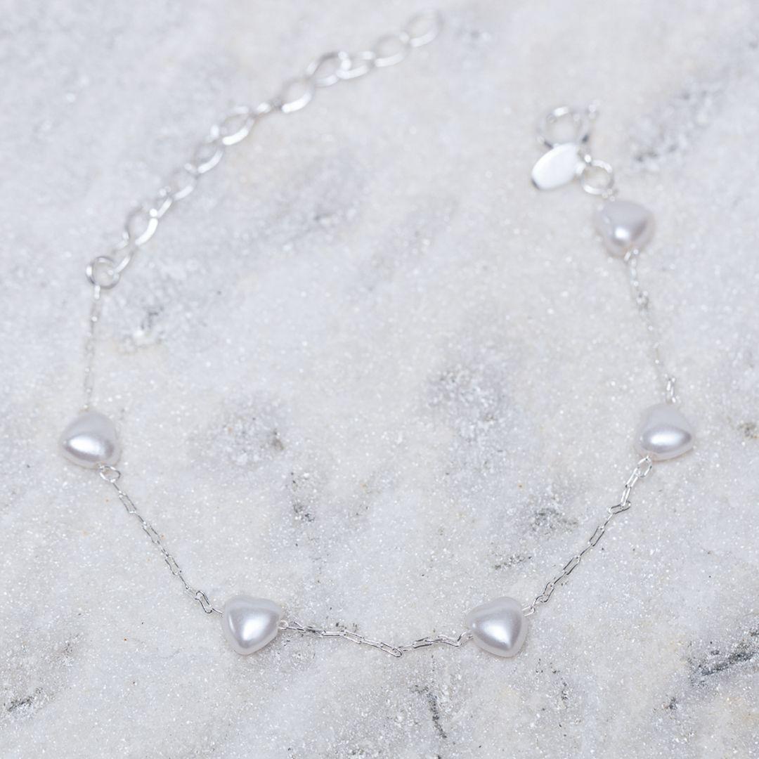 PULSEIRA PÉROLA CORAÇÃO CT BANHO PRATA
