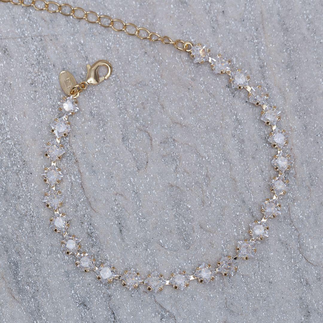 PULSEIRA RIVIERA COM PEDRAS CRISTAIS BANHO OURO 18K