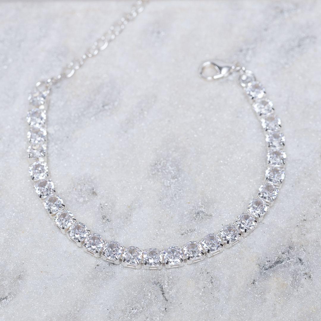 PULSEIRA RIVIERA GROSSA CRISTAL CT BANHO PRATA