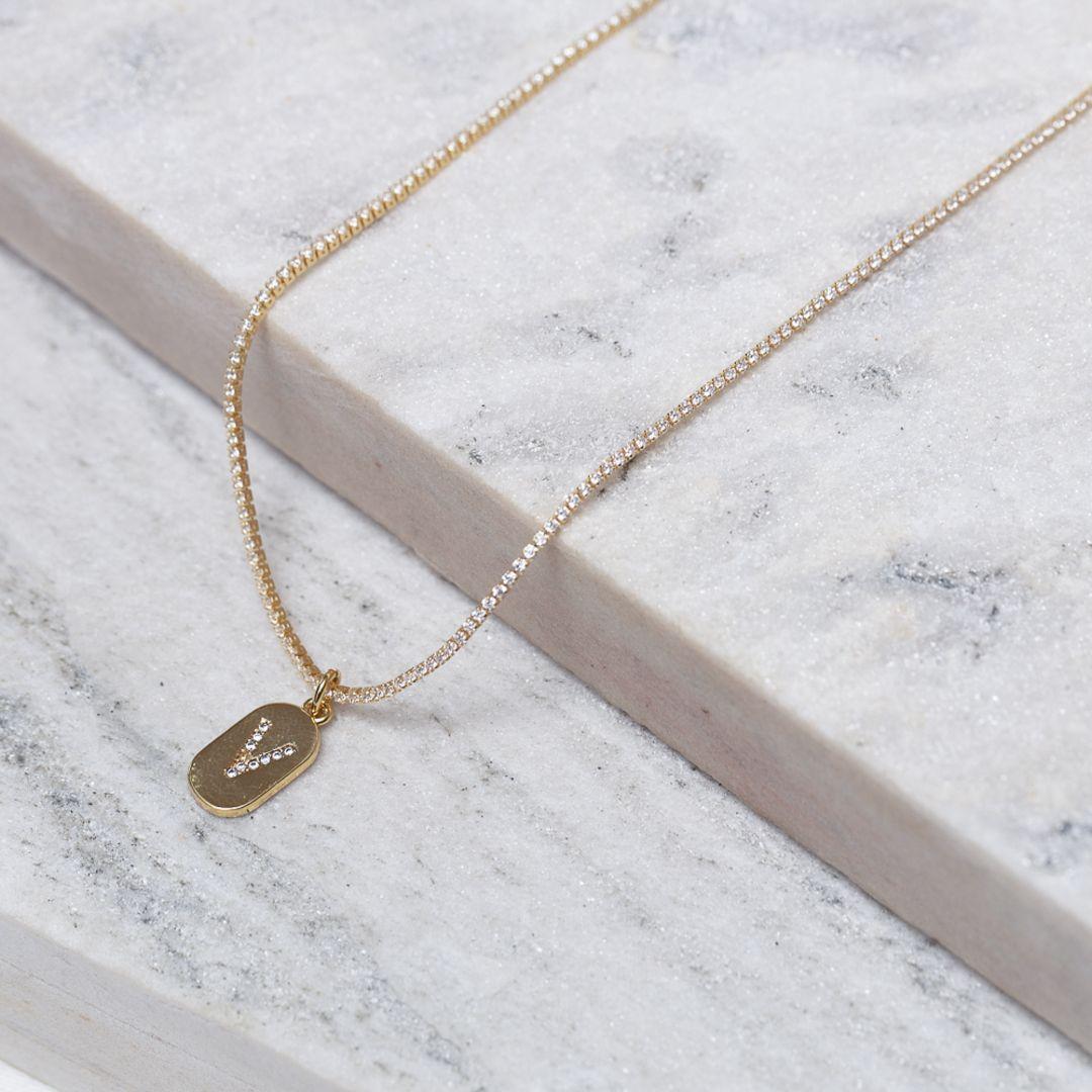 CHOKER RIVIERA PP COM LETRA V CRISTAL BANHO OURO 18K